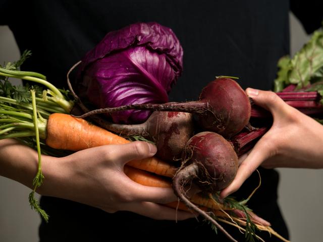 armload of veggies rich in anthocyanin