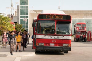 modern and vintage Unitrans buses